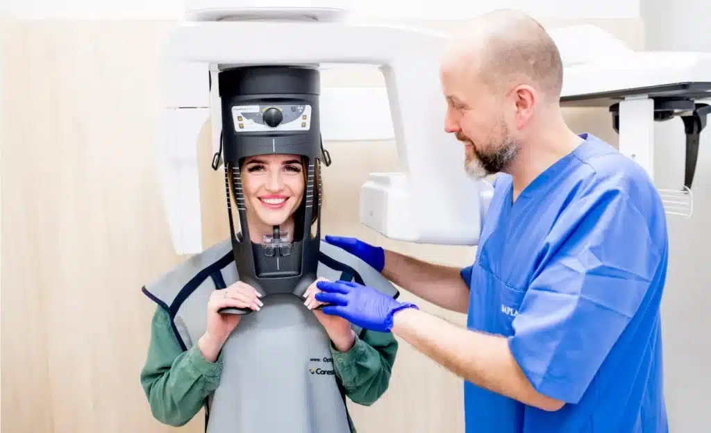 lek. dent. Tomasz Bobek Specjalizacja: Implantologia i Endodoncja | Numer PWZ: 1304071, zdjęcie RTG zębów przed leczeniem kanałowym – diagnostyka endodontyczna w Krakowie